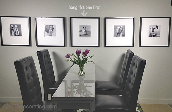 Picture hanging tip: odd number of frames is better than even